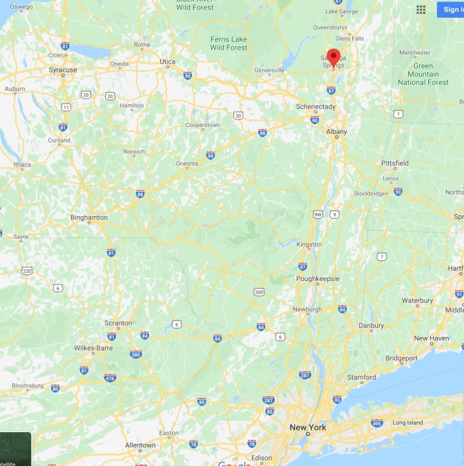 Map of New York State with a red pin in the location of Saratoga Springs.