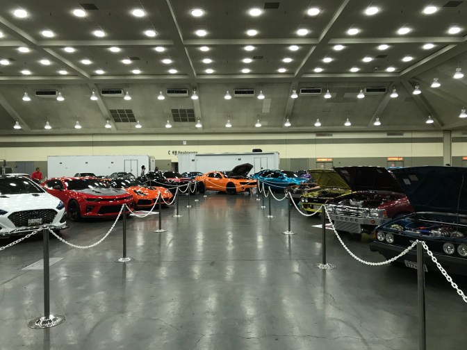 Two rows of classic cars.