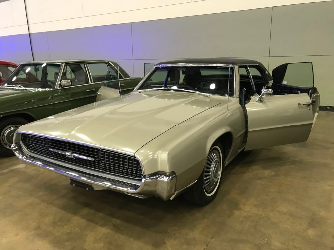 1967 Ford Thunderbird with doors open.