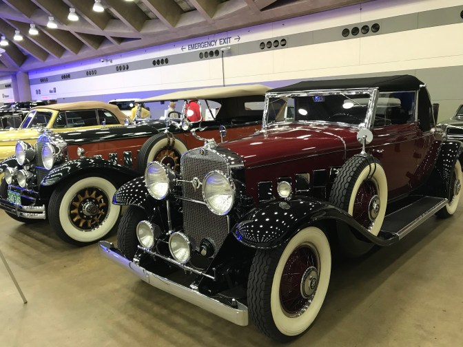 Classic Packard and Cadillac coupes.
