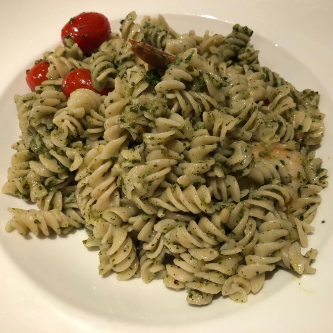 Gluten-free pasta with shrimp and tomatoes.