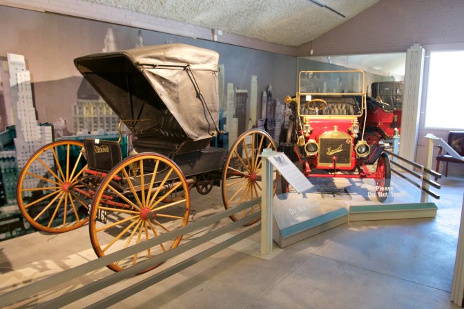 1909 Paterson Motor Buggy and 1910 Maxwell.