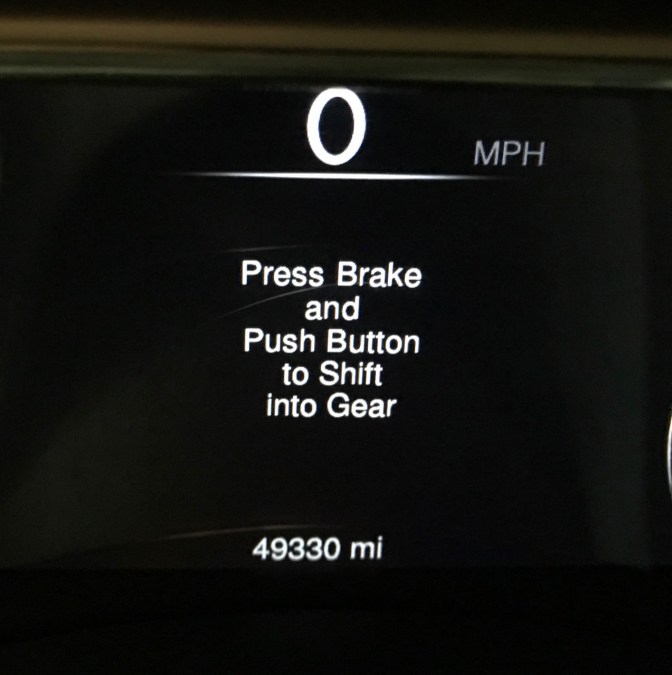 Car odometer that reads 49330 mi