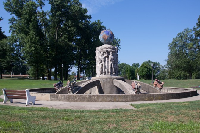 Light Dispelling Darkness sculpture fountain.