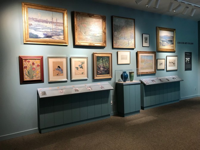 Artwork in museum displaying works from local artists in the late 19th and early 20th centuries.