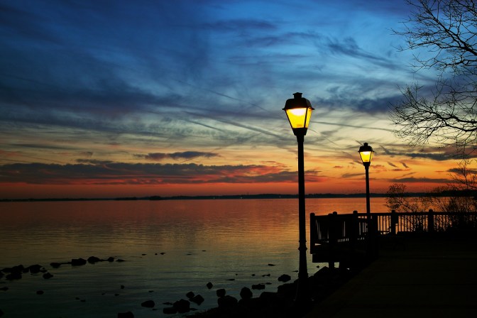 Image of the Susquehanna River in Maryland, with pier and lights in foreground.