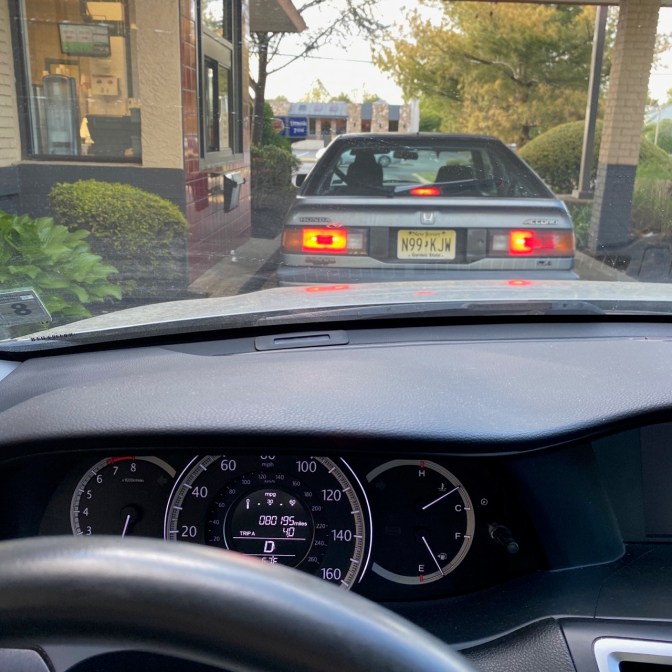View of 3rd generation Honda Accord hatchback from behind wheel of 2015 Honda Accord.