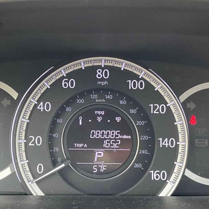 Car odometer reading 080085 TRIP A 165.2