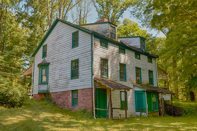 Abandoned two-story house.