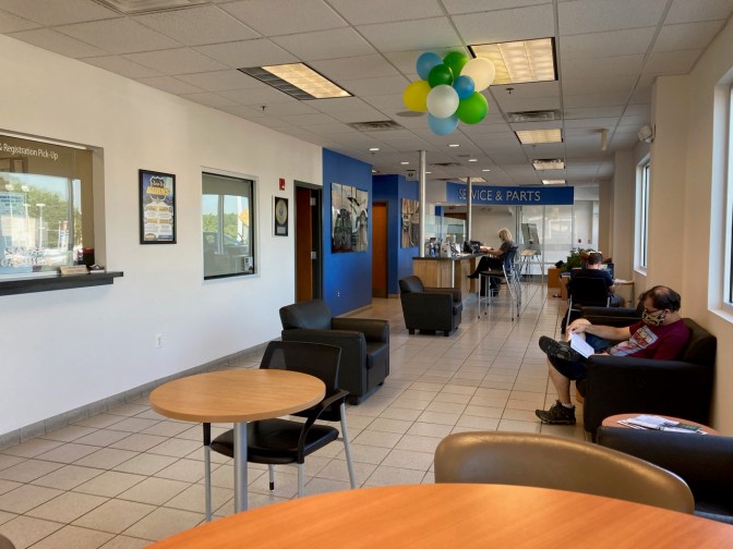 Interior of waiting room for service center at Honda dealer.