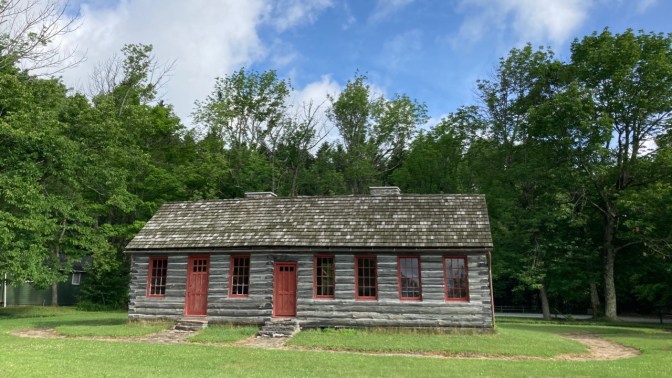 Small cottage in park.