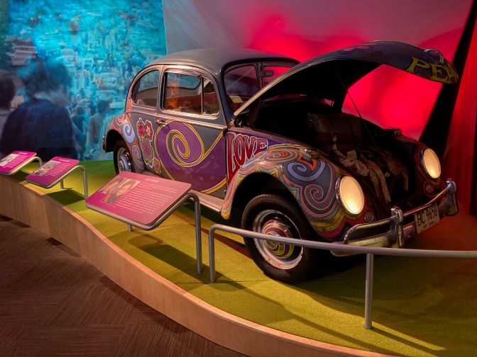 VW Beatle painted in hippie colors.