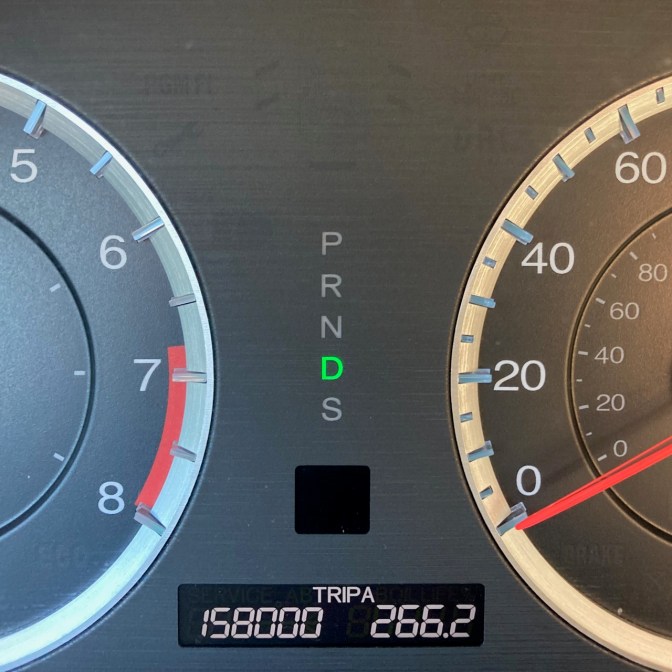 Car odometer reading 158000 TRIP A 266.2