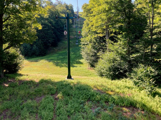 View of chair lift, looking upward.