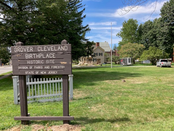 Sign on lawn that says GROVER CLEVELAND BIRTHPLACE HISTORIC SITE.