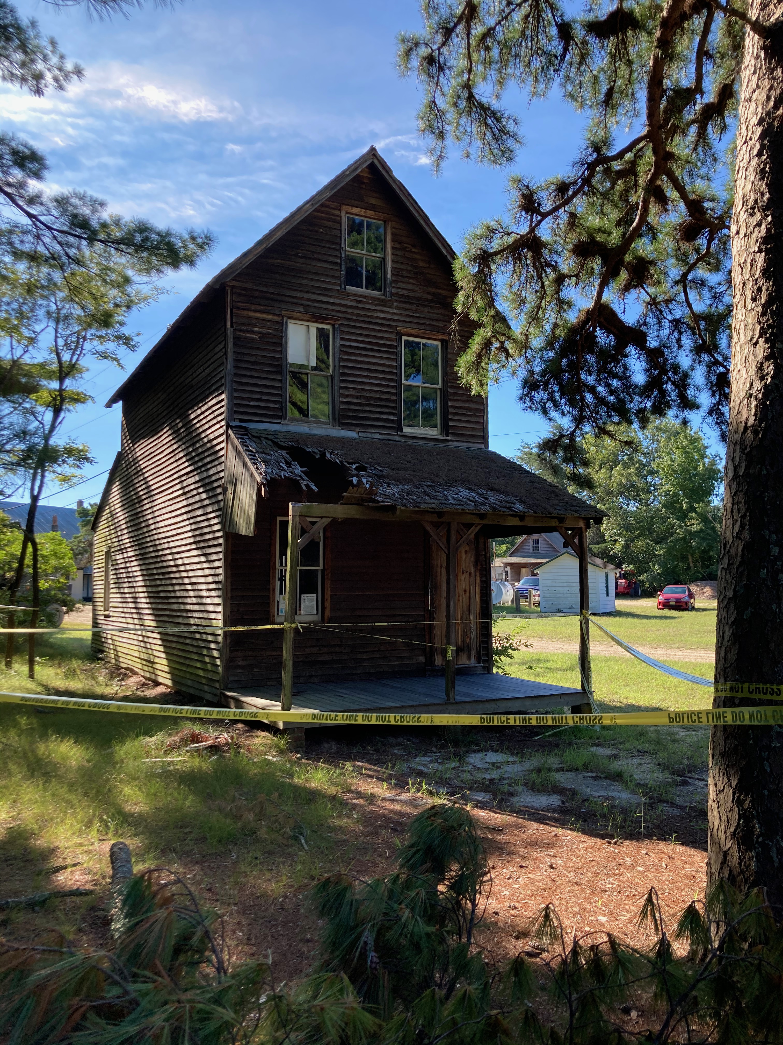 Burke House, with damage to front porch roof.