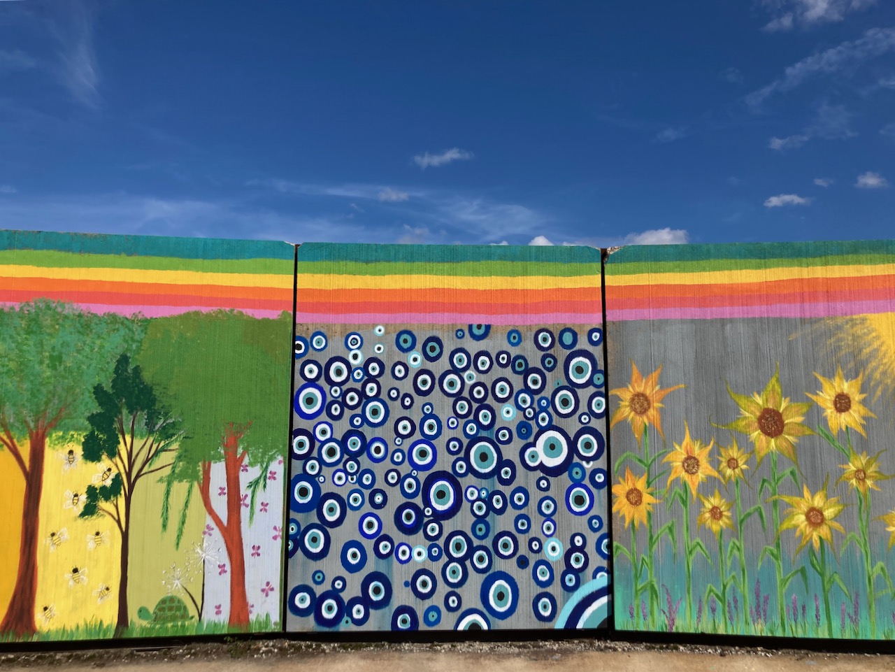 Mural on concrete wall.