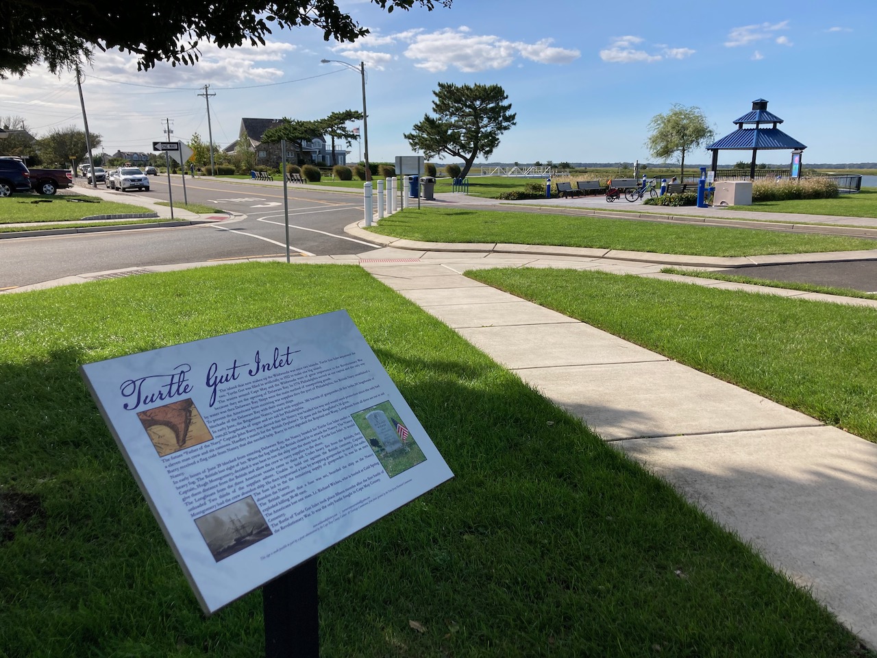 Marker for Turtle Gut Inlet in small park.