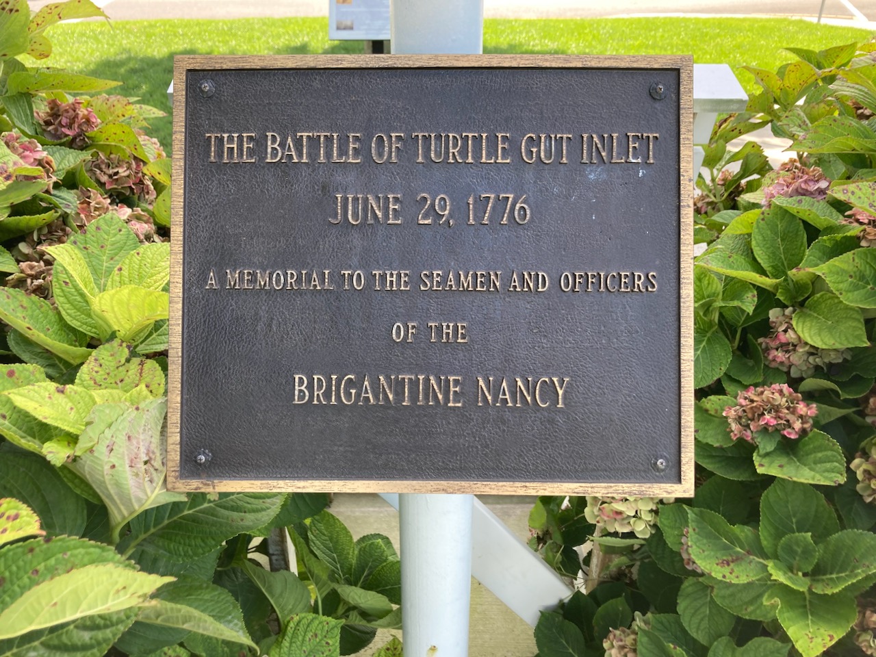 Marker that says THE BATTLE OF TURTLE GUT INLET JUNE 29 1776 A MEMORIAL TO THE SEAMEN AND OFFICERS OF THE BRIGANTINE NANCY.