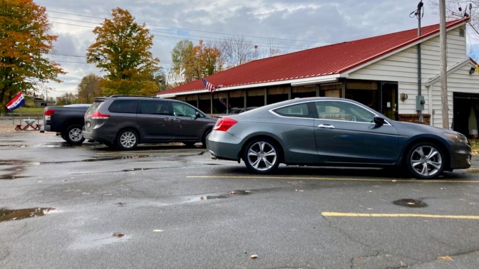 2012 Honda Accord coupe parked in front of Kayuta.