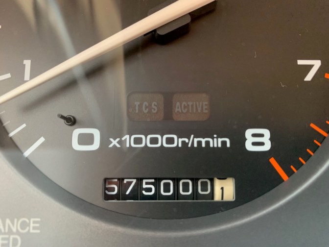 Car odometer reading 575000.1 miles