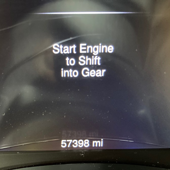 Car odometer reading 57398 miles.