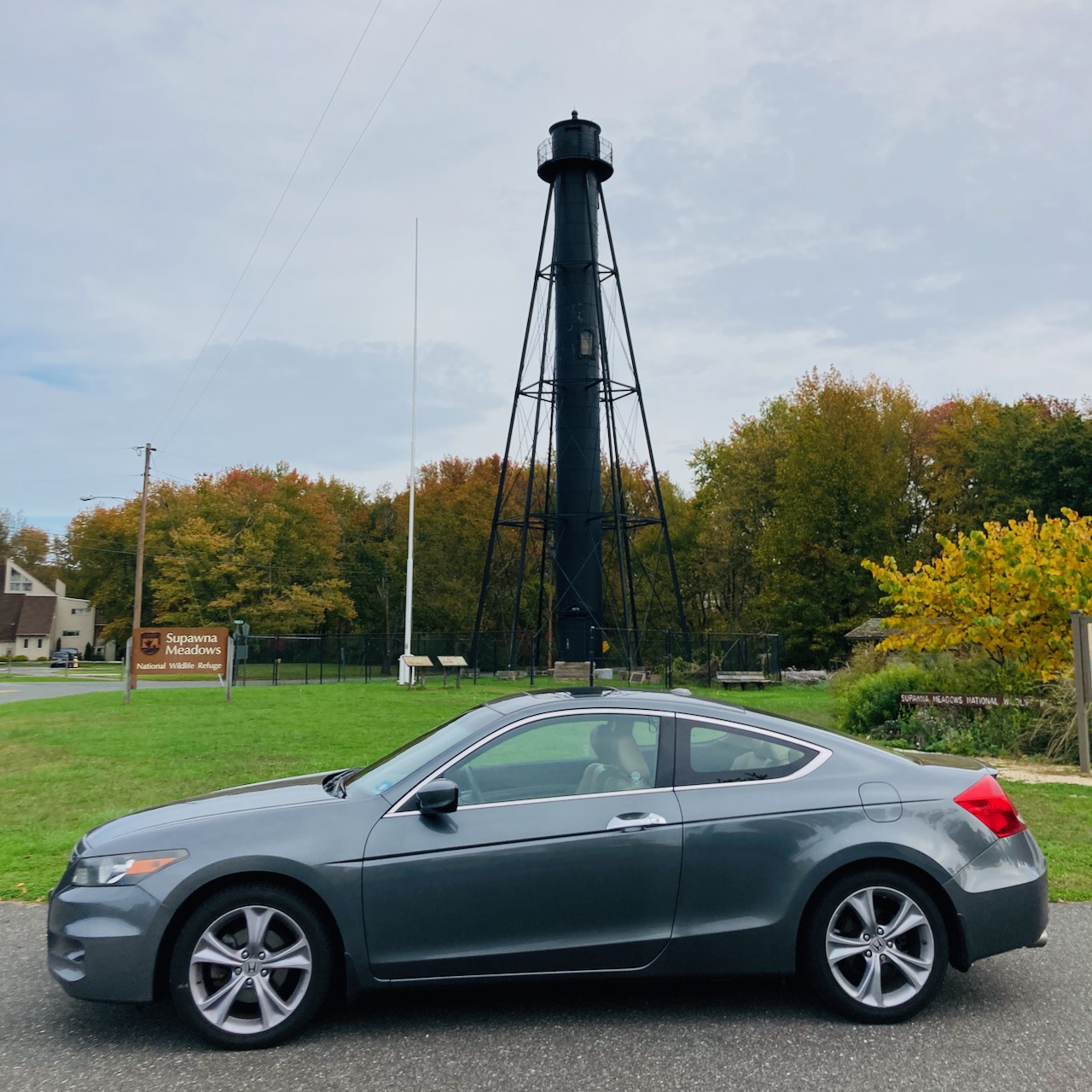 2012 Honda Accord coupe asked in front of Finns Points Rear Range Lighthouse.