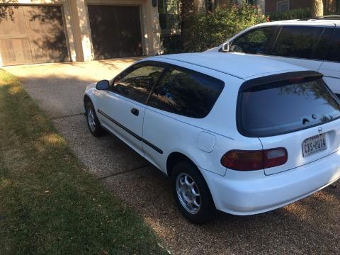 1992 white Honda Civic VX parked in driveway