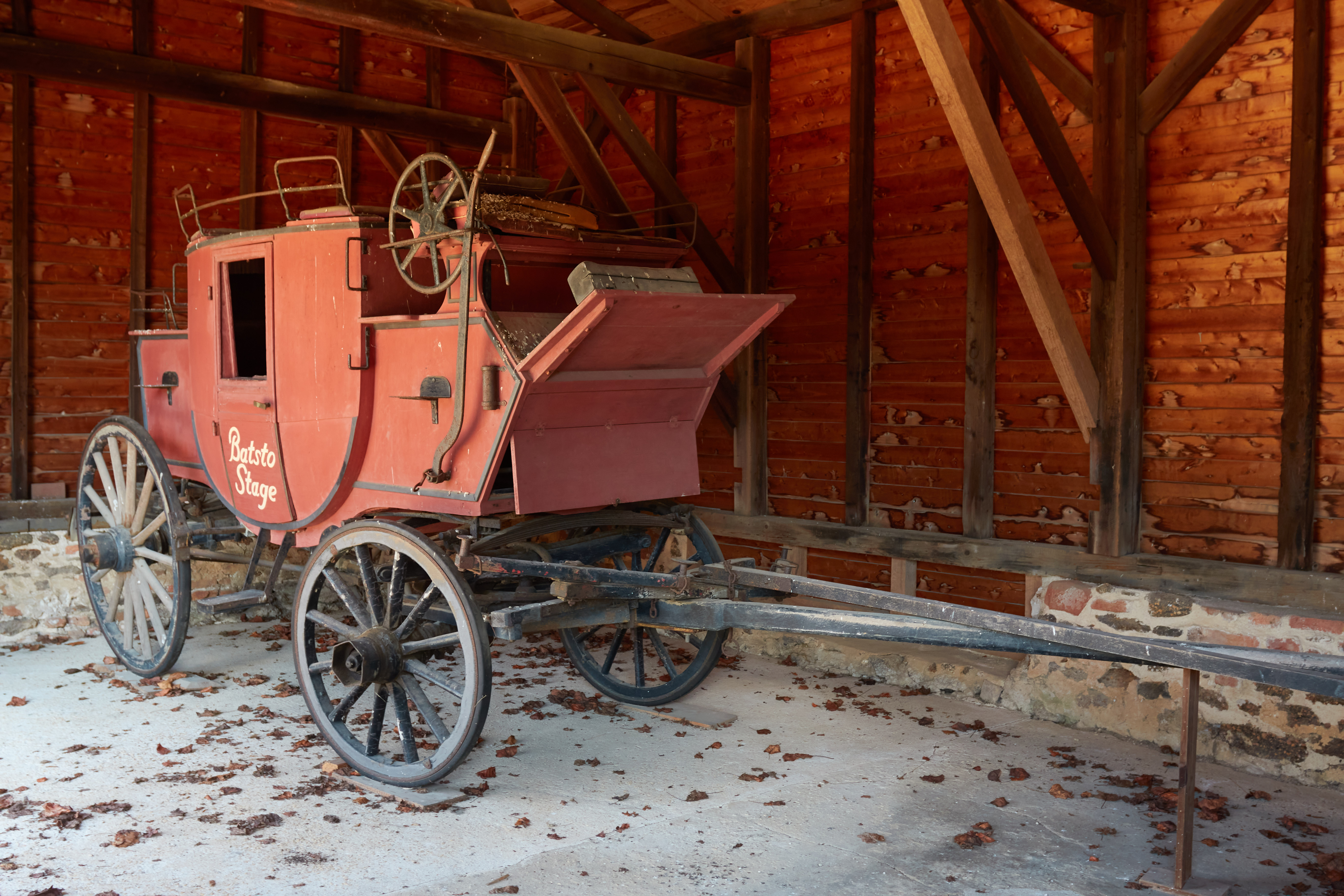 Stagecoach in barn.