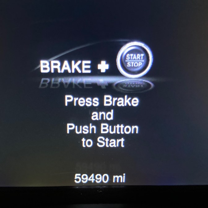 Car odometer reading 59490 miles.