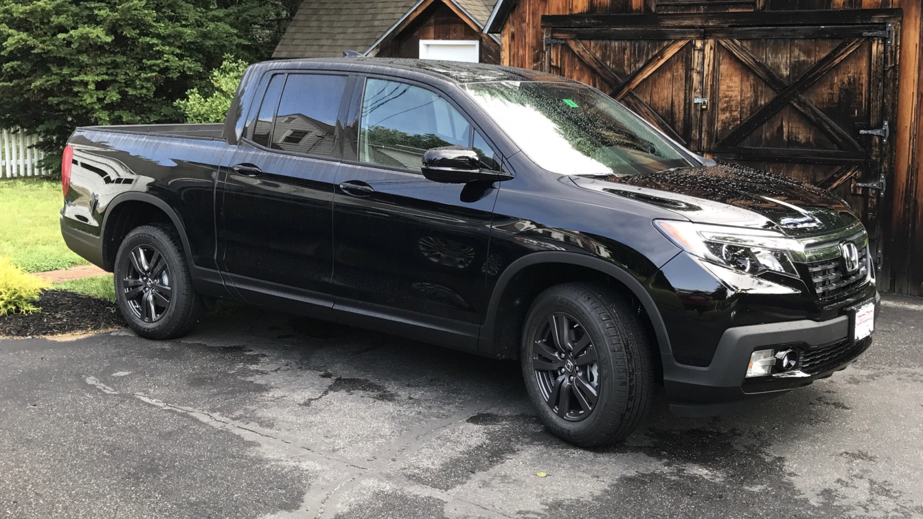 Black 2017 Honda Ridgeline pickup truck.
