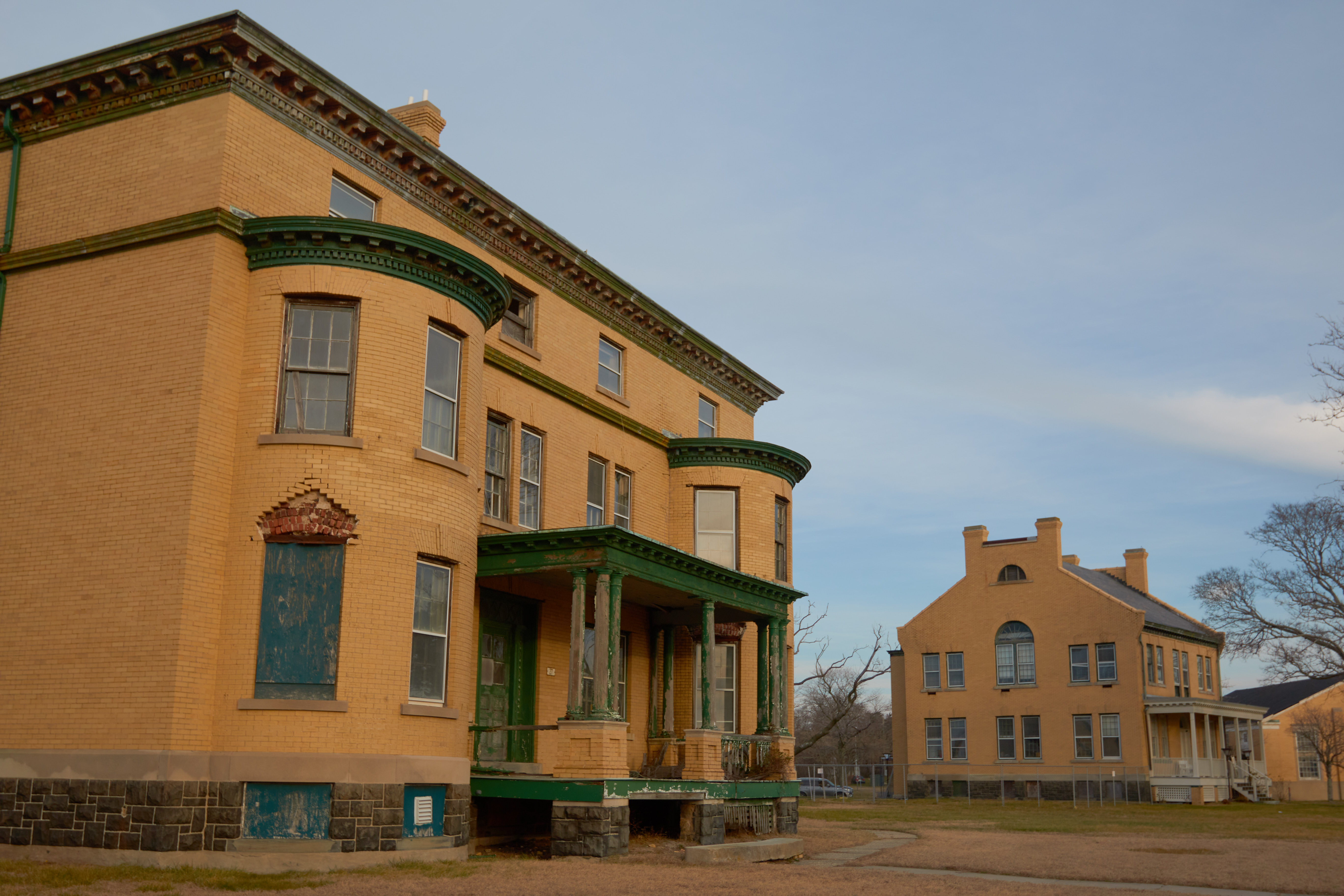 Left building is the Bachelors Officers Quarters and the right building is the park headquarters.