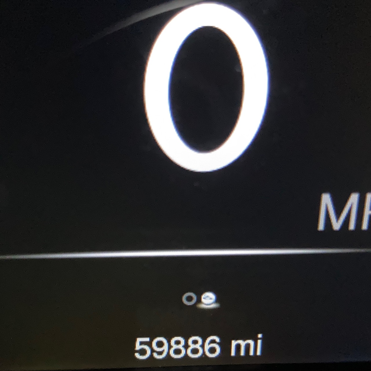 Car odometer reading 59886 miles.