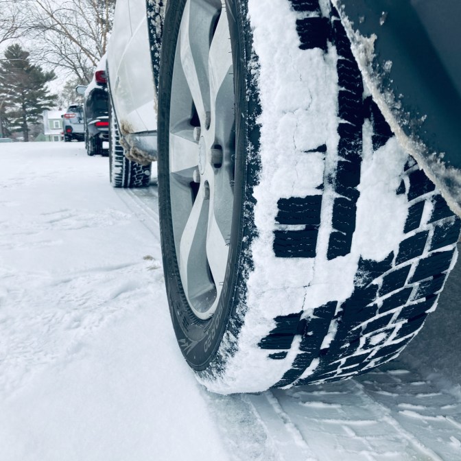 Jeep with Nokian WR G4 tires in snow. The tires are covered in snow.
