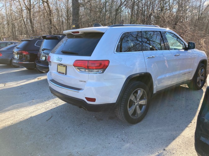 2014 white Jeep Grand Cherokee.