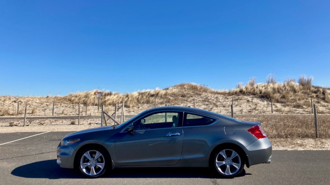 2012 Honda Accord coupe, parked in front of sand dune.