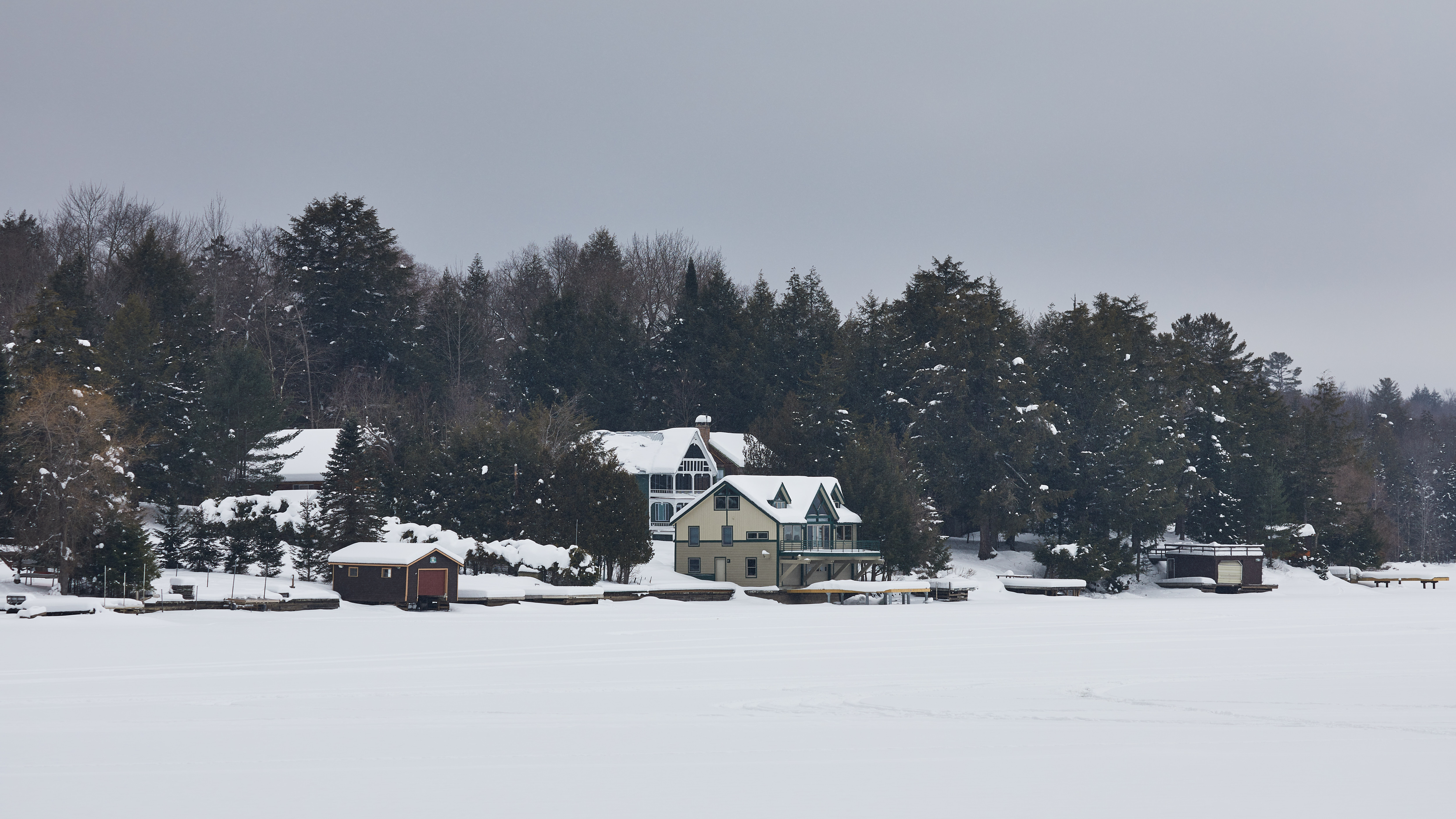 View of houses along shore of Fourth Lake.