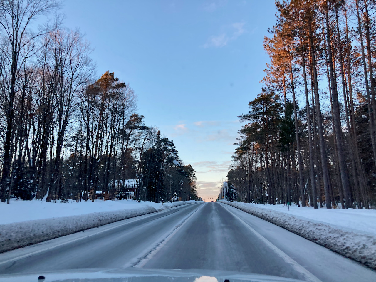 Snow- and tree-lined NY 28.
