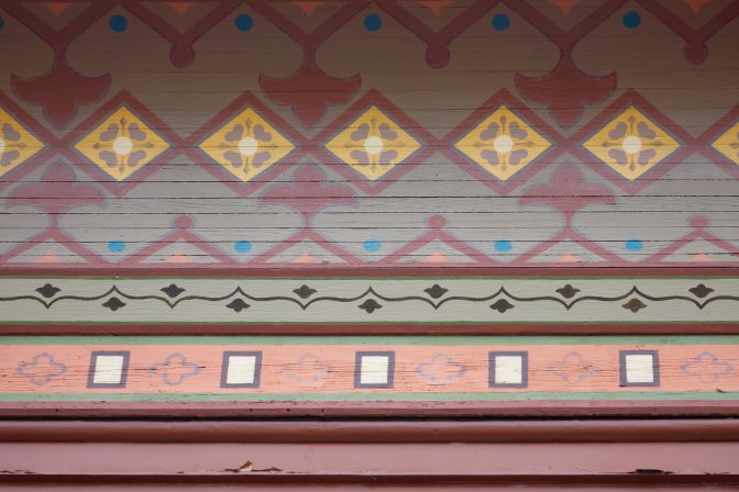 Patterned design beneath eaves.