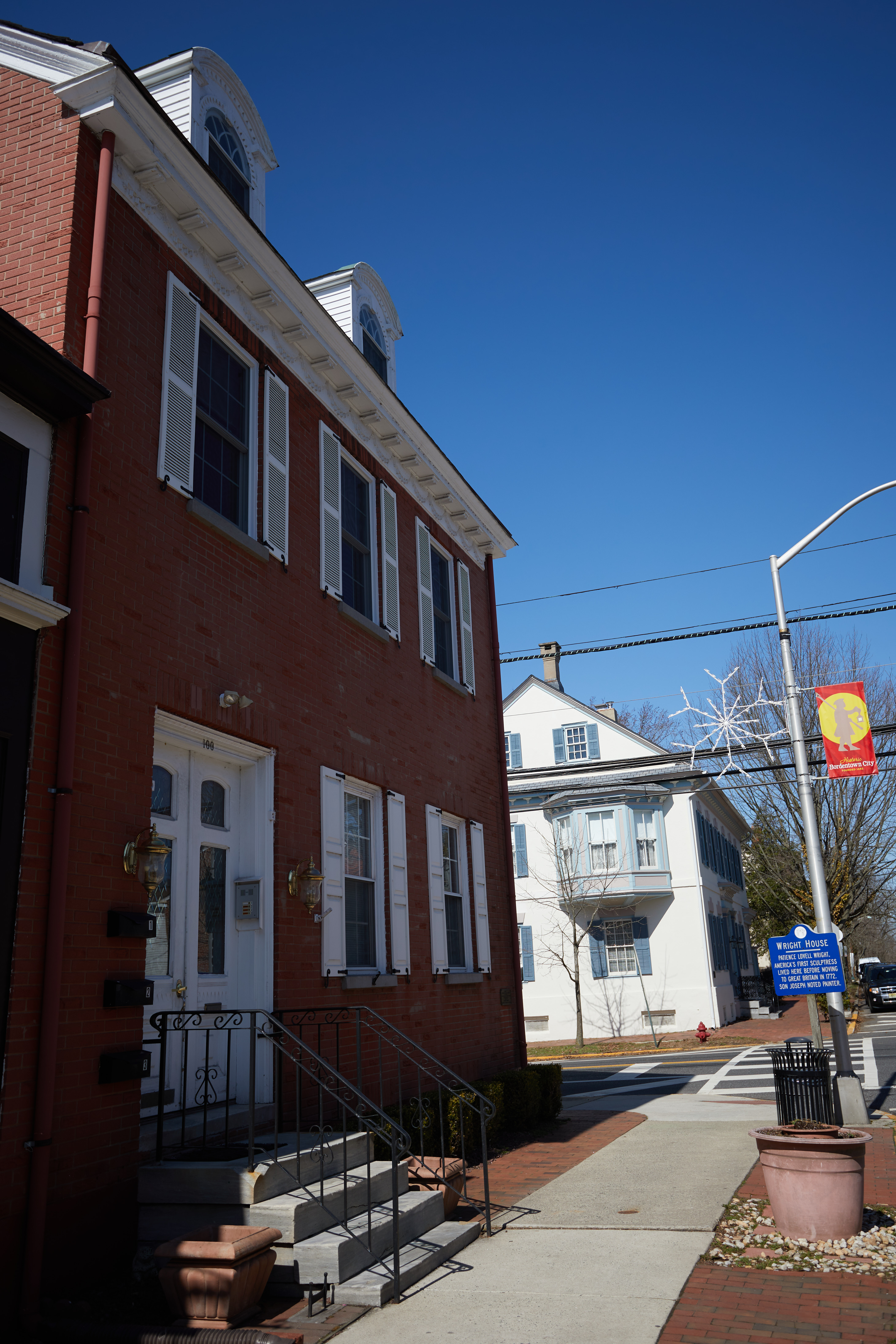 Exterior of Patience Lovell Wright House, a brick two-story house.