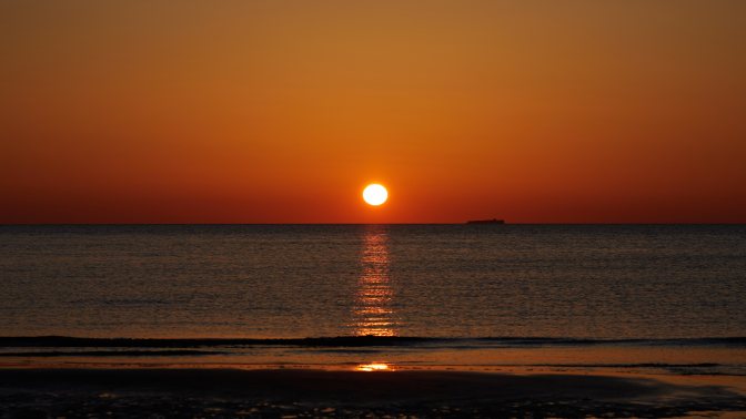 Sunset over beach in Cape May.