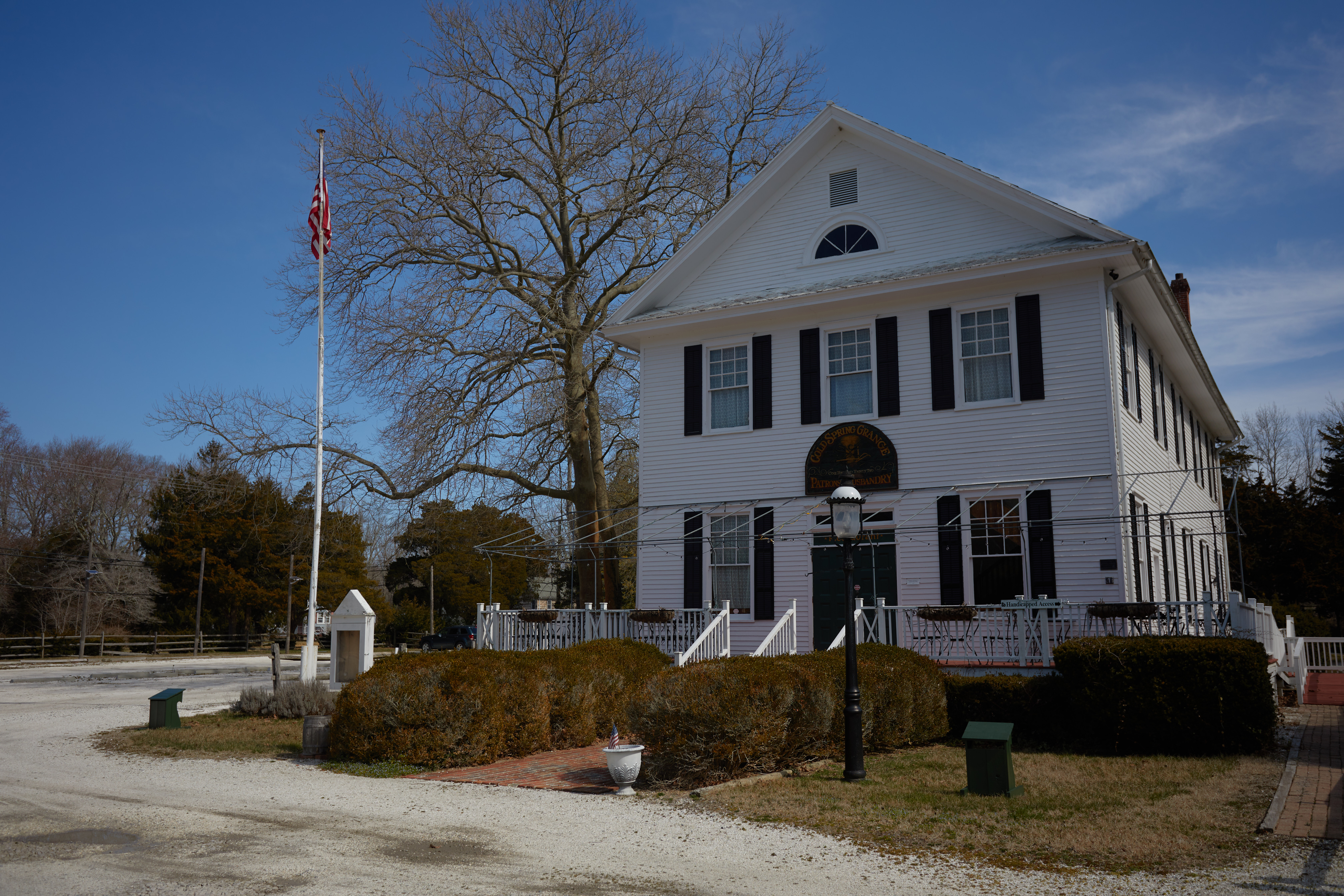 Exterior of white two-story house in Cold Spring Village.
