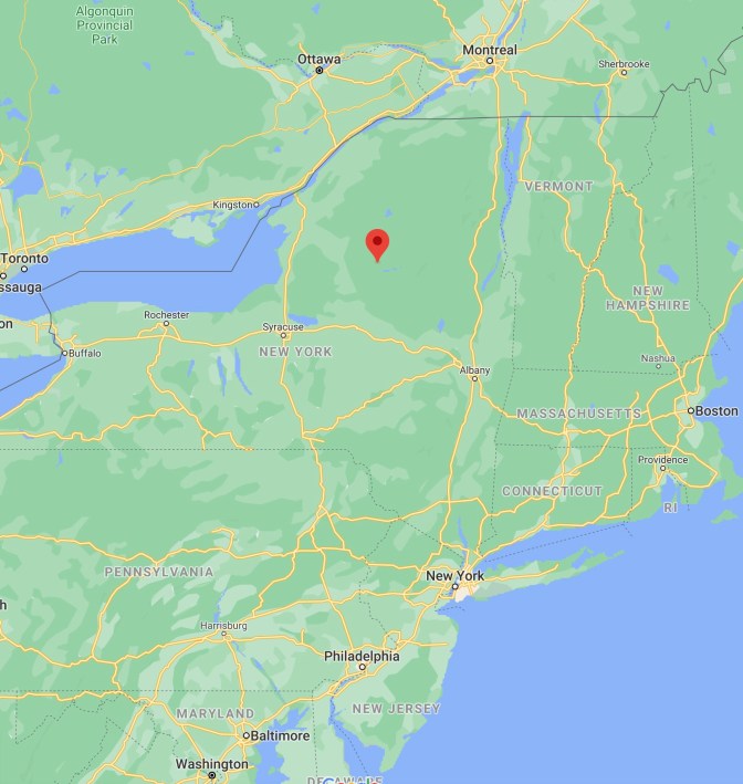Map of New York state, with red pin in location of Adirondack Park.
