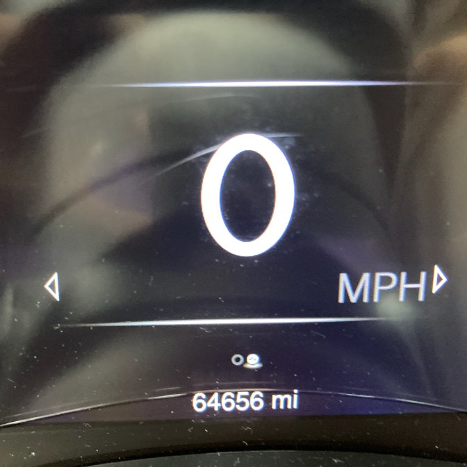 Car odometer reading 64656 miles