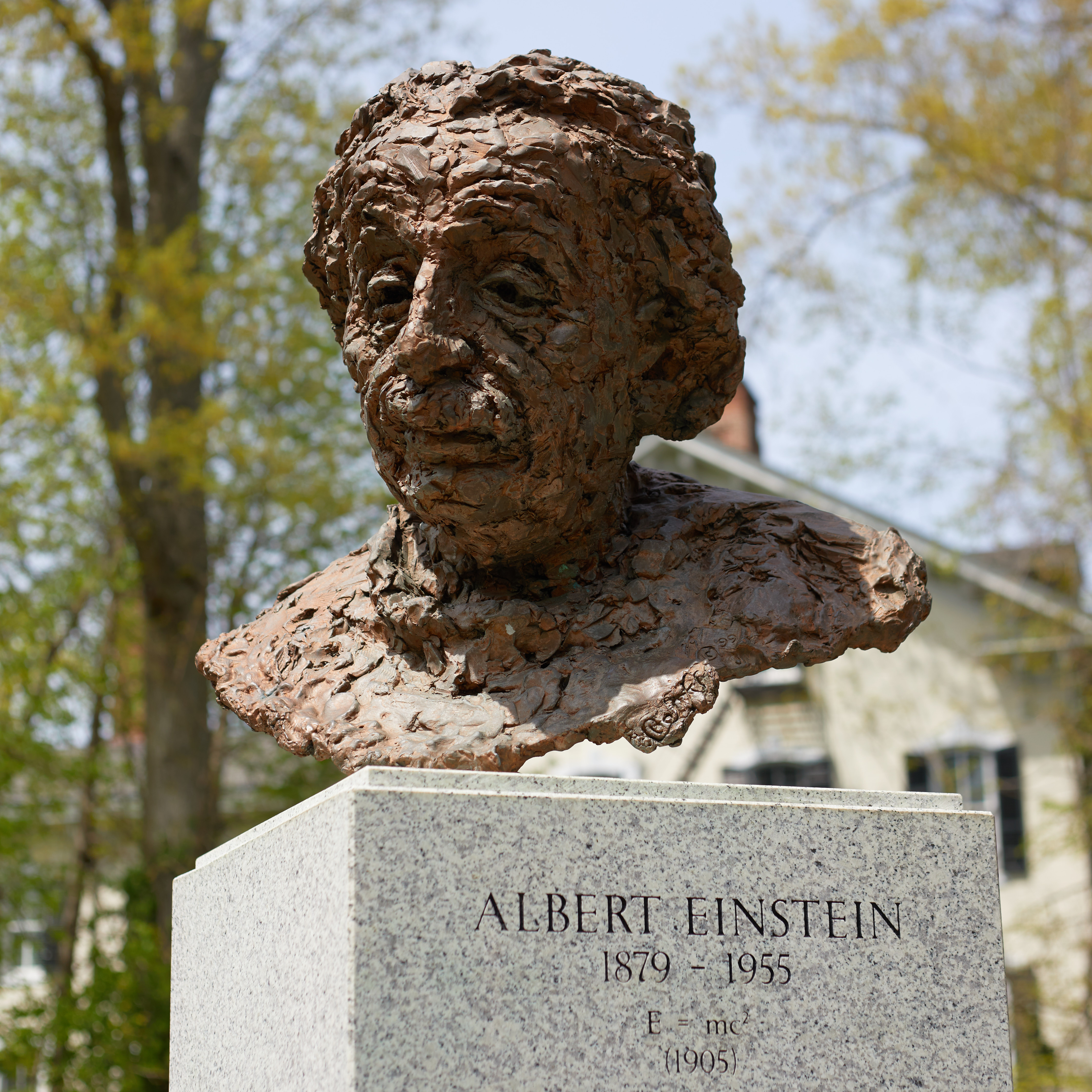 Bust of Albert Einstein on pedestal.