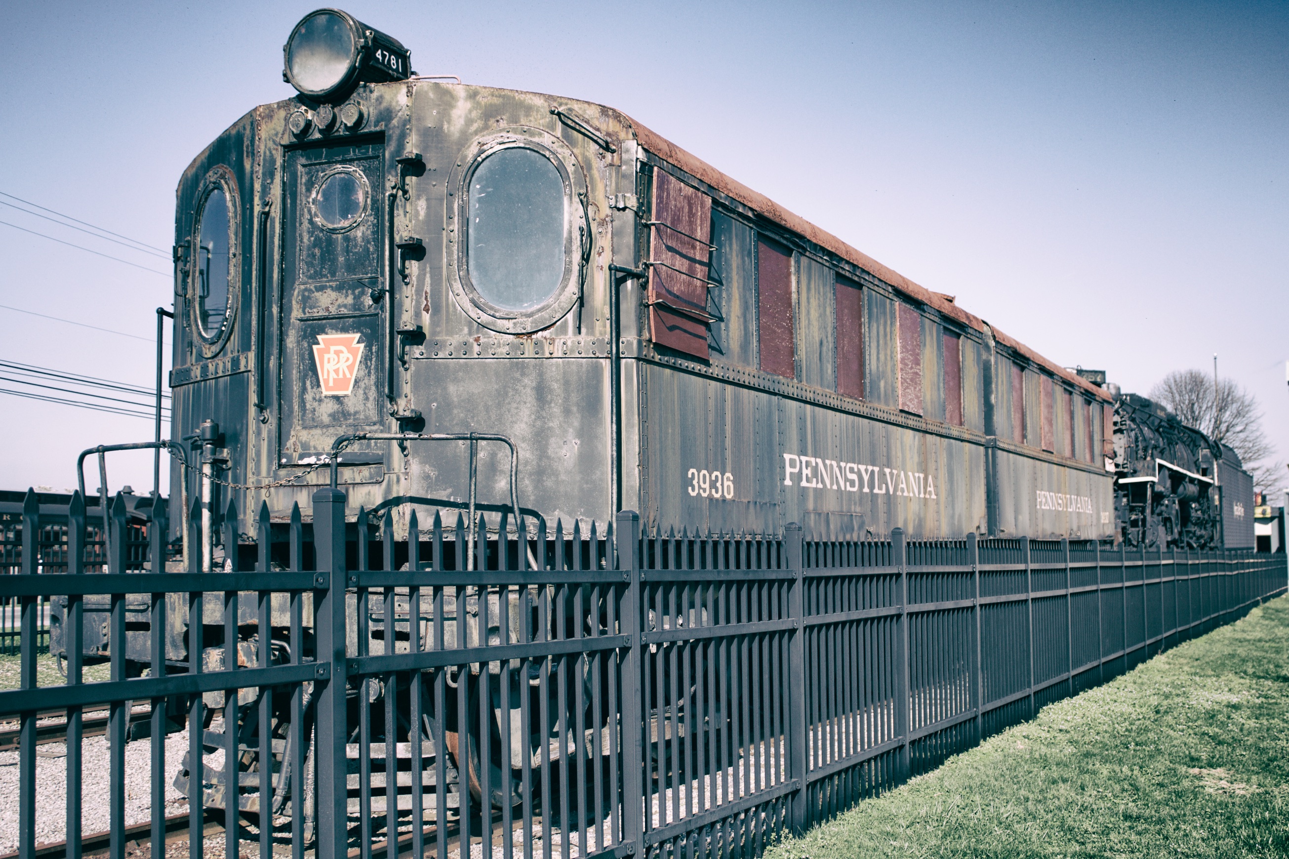 Electric train in train yard.