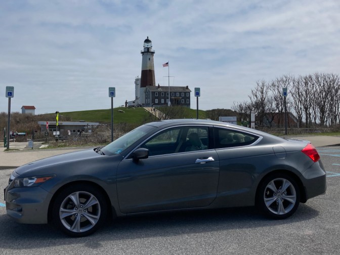 2012 Honda Accord parked in lot, with Montauk Point lighthouse in distance.