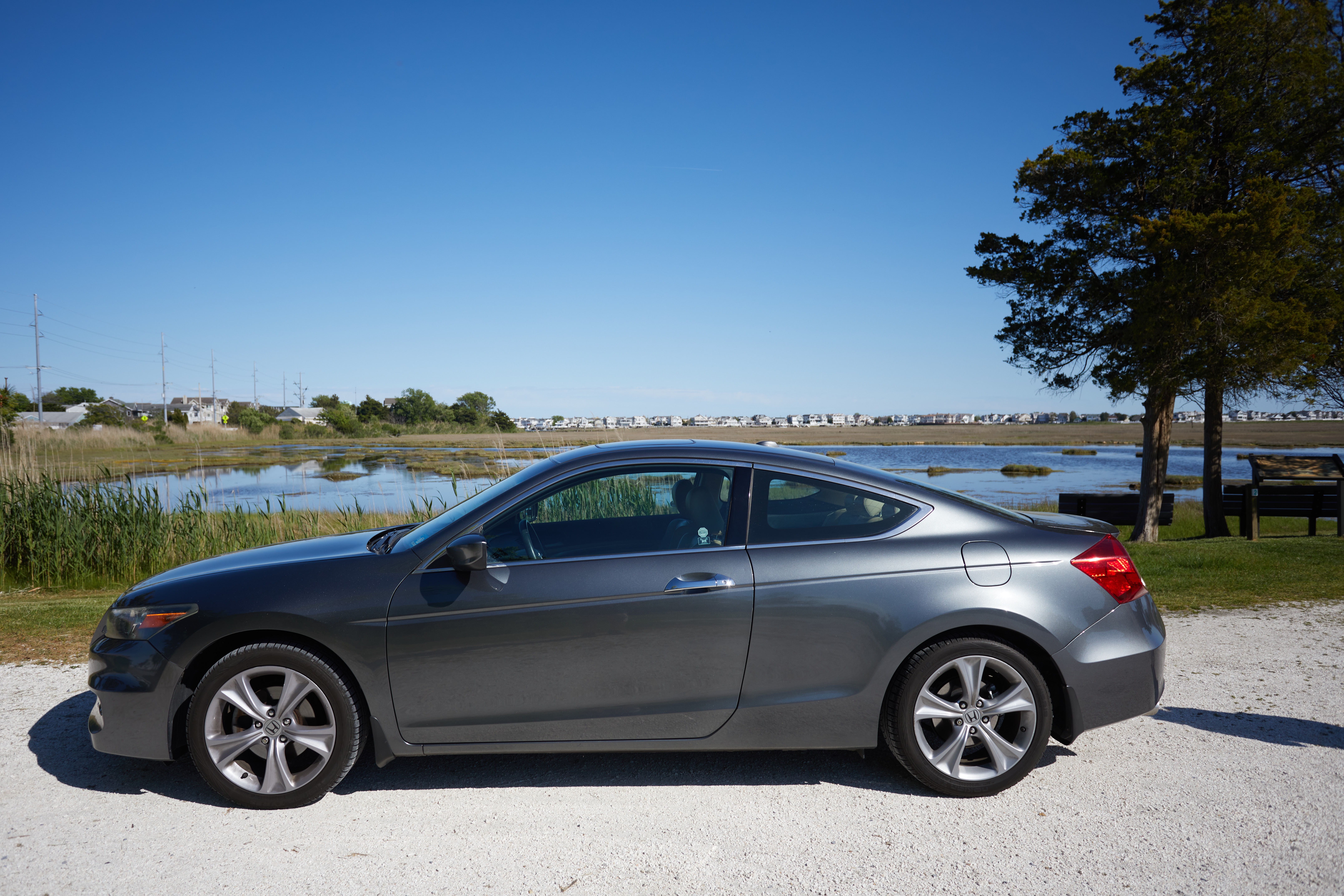2012 Honda Accord parked in front of marshland at the Wetlands Institute.