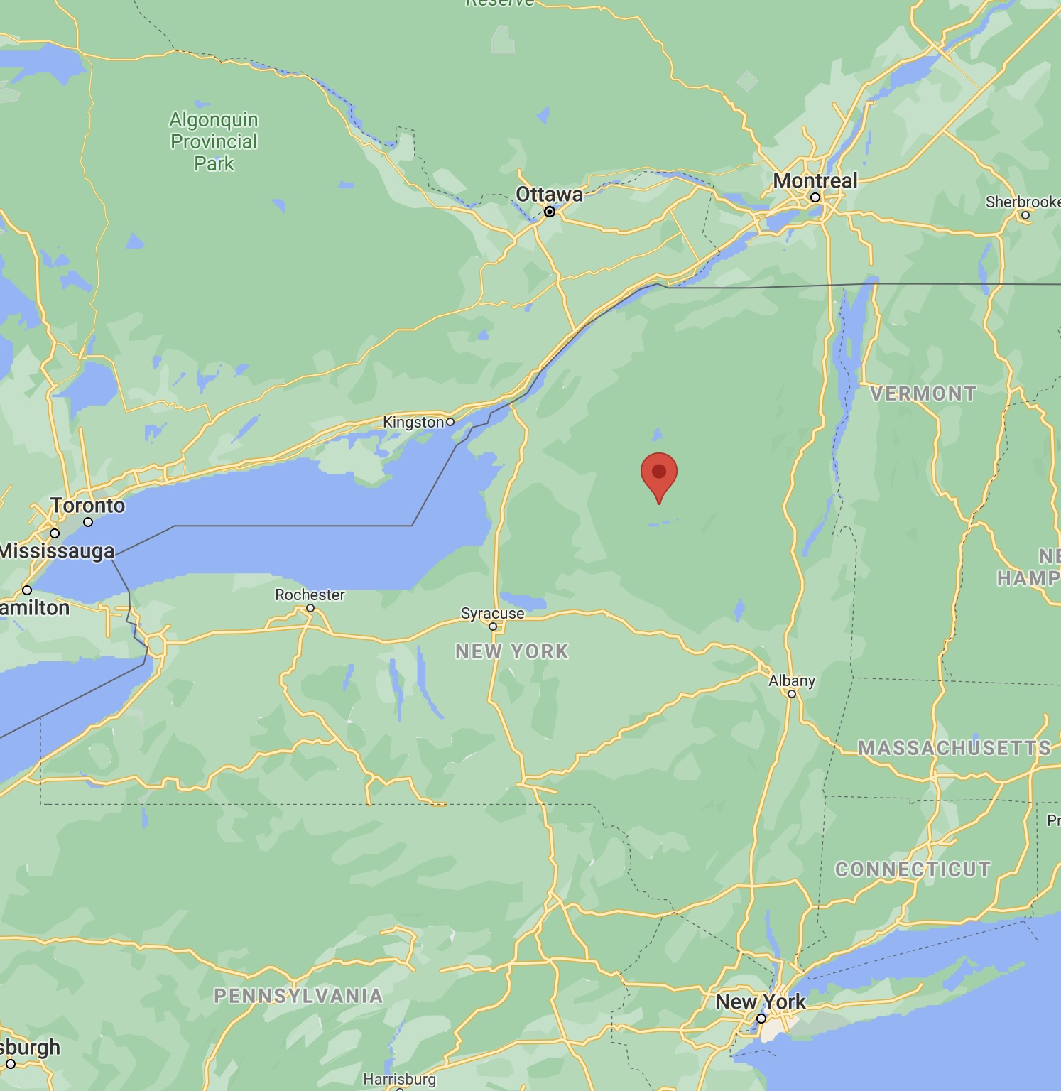 Map of New York state, with red pin in location of Eagle Bay, NY.