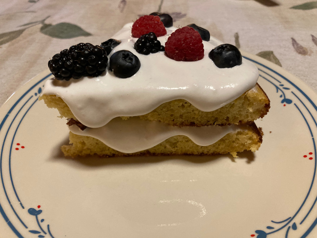 Lemon cake with icing and fruit.
